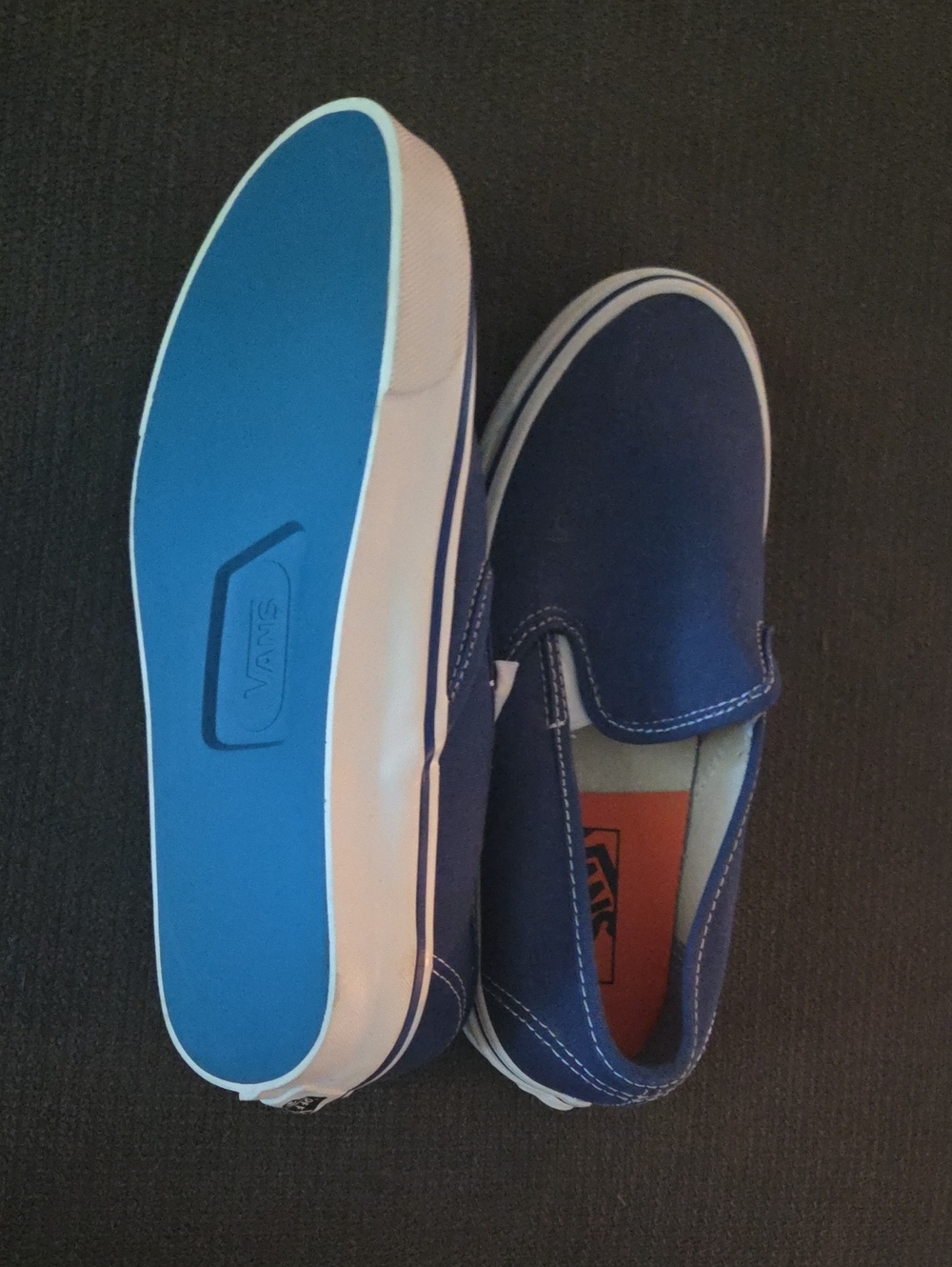Vans Slip-On Sneakers in Dark Blue with Blue Soles